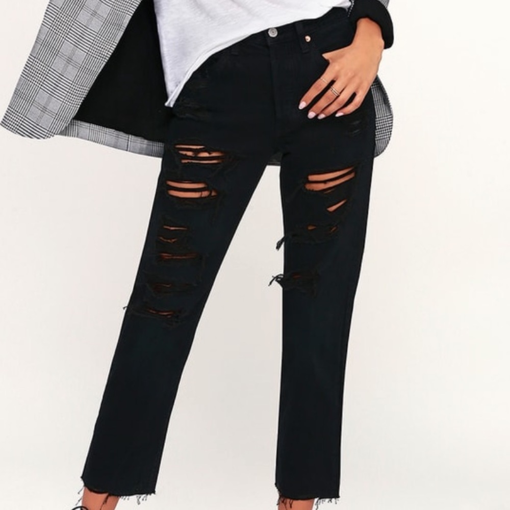 Levi’s 501 black distressed jeans